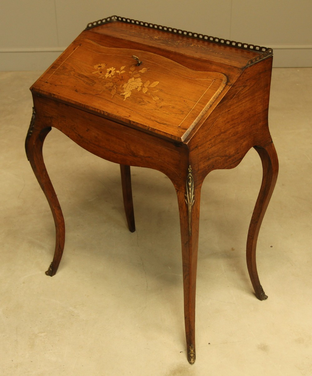 A 19th century rosewood bureau de dame View VII