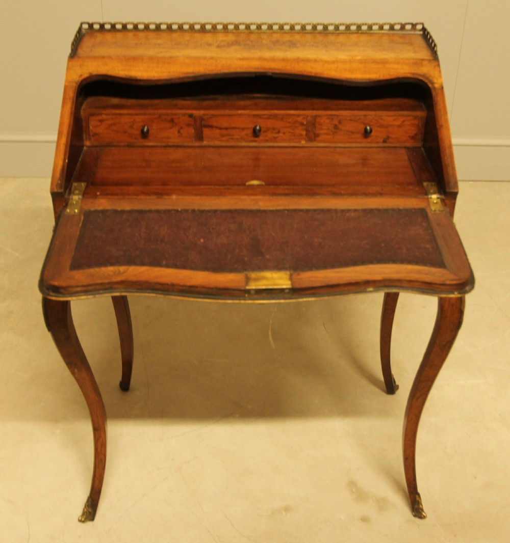 A 19th century rosewood bureau de dame View VIII