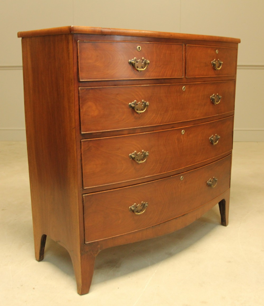 A REGENCY MAHOGANY BOW FRONTED CHEST OF DRAWERS View III