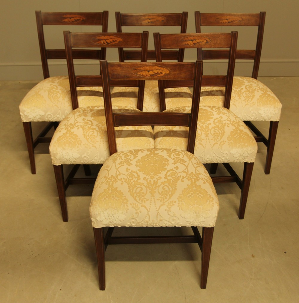 A SET OF SIX 19TH CENTURY INLAID DINING CHAIRS