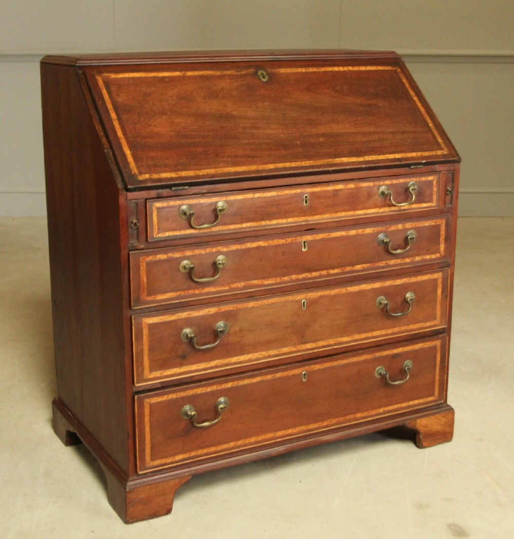 A GEORGIAN MAHOGANY BUREAU