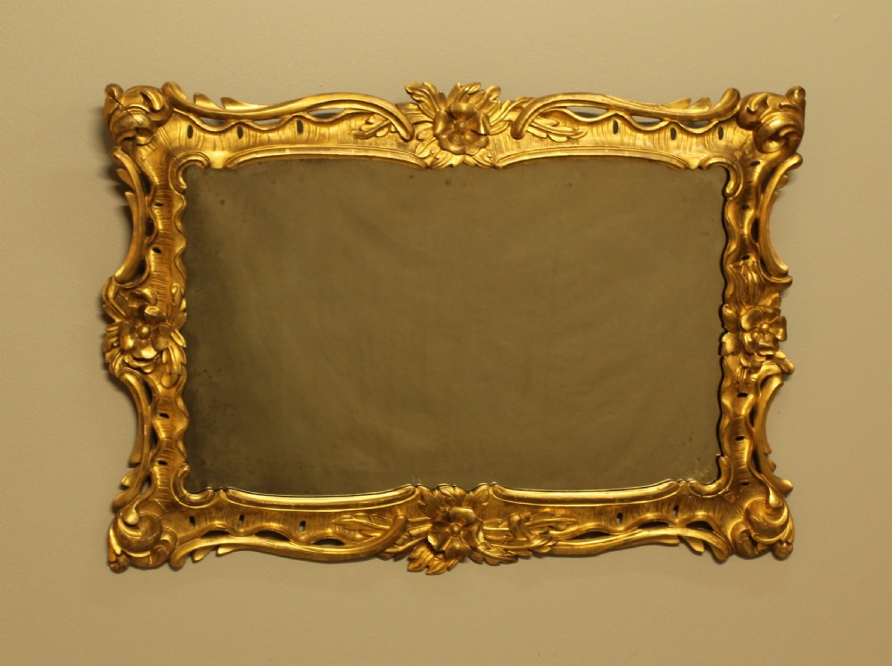 A GEORGIAN GILTWOOD MIRROR