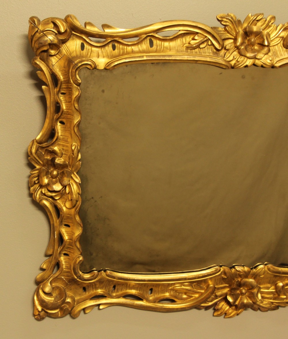 A GEORGIAN GILTWOOD MIRROR View II