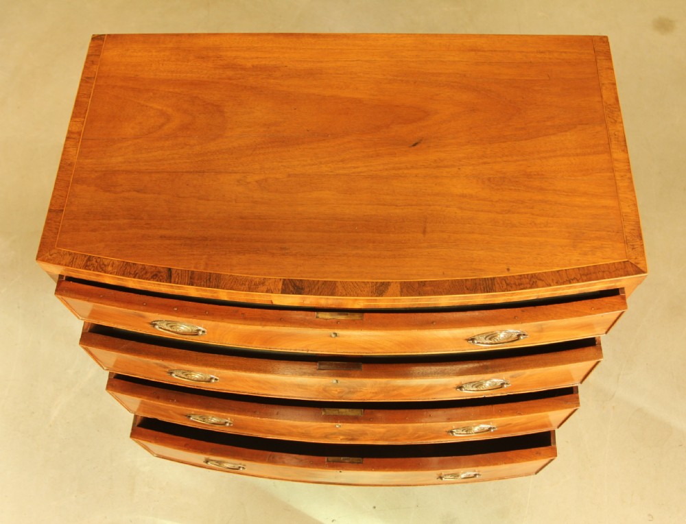 A 19TH CENTURY BOW FRONTED CHEST OF DRAWERS View VII