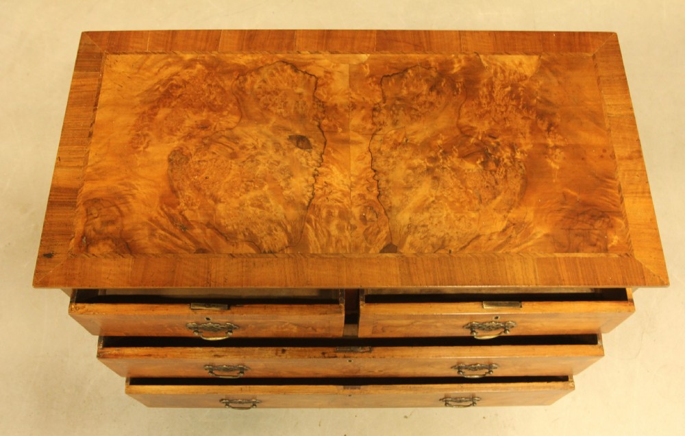 A BURR WALNUT CHEST OF DRAWERS View IV
