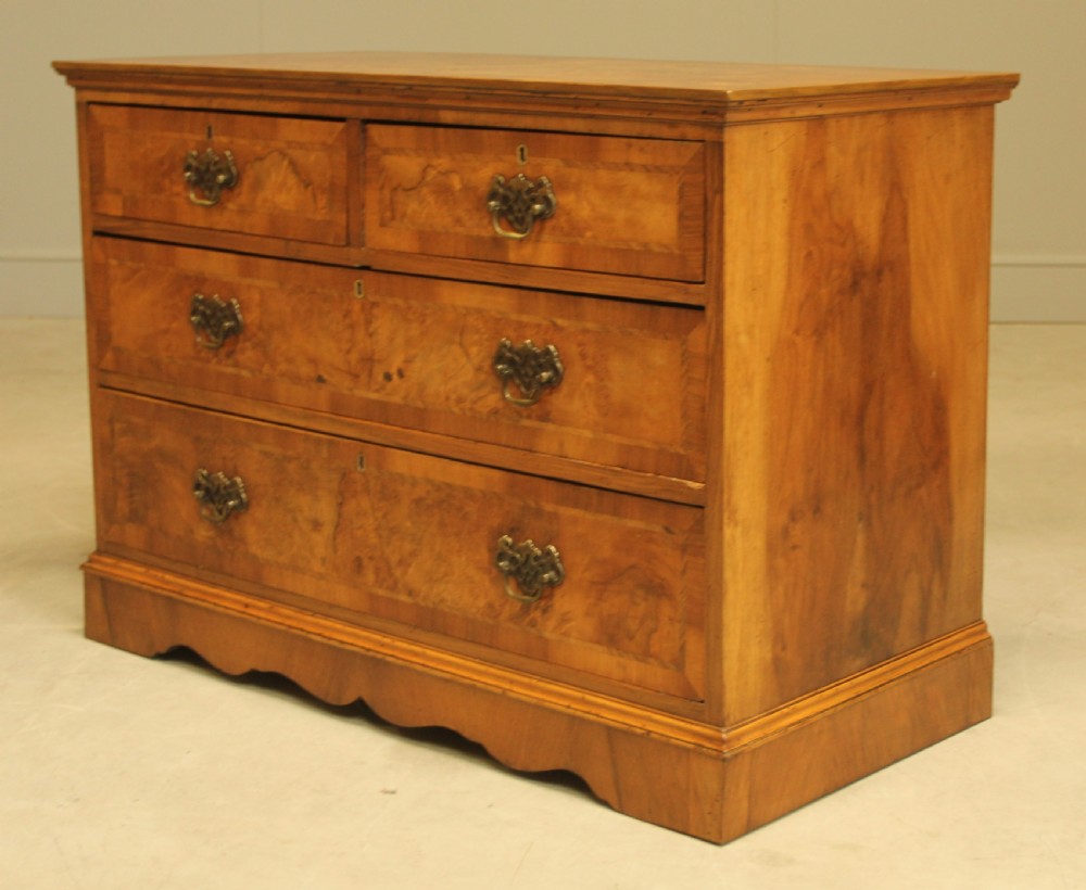 A BURR WALNUT CHEST OF DRAWERS View VI