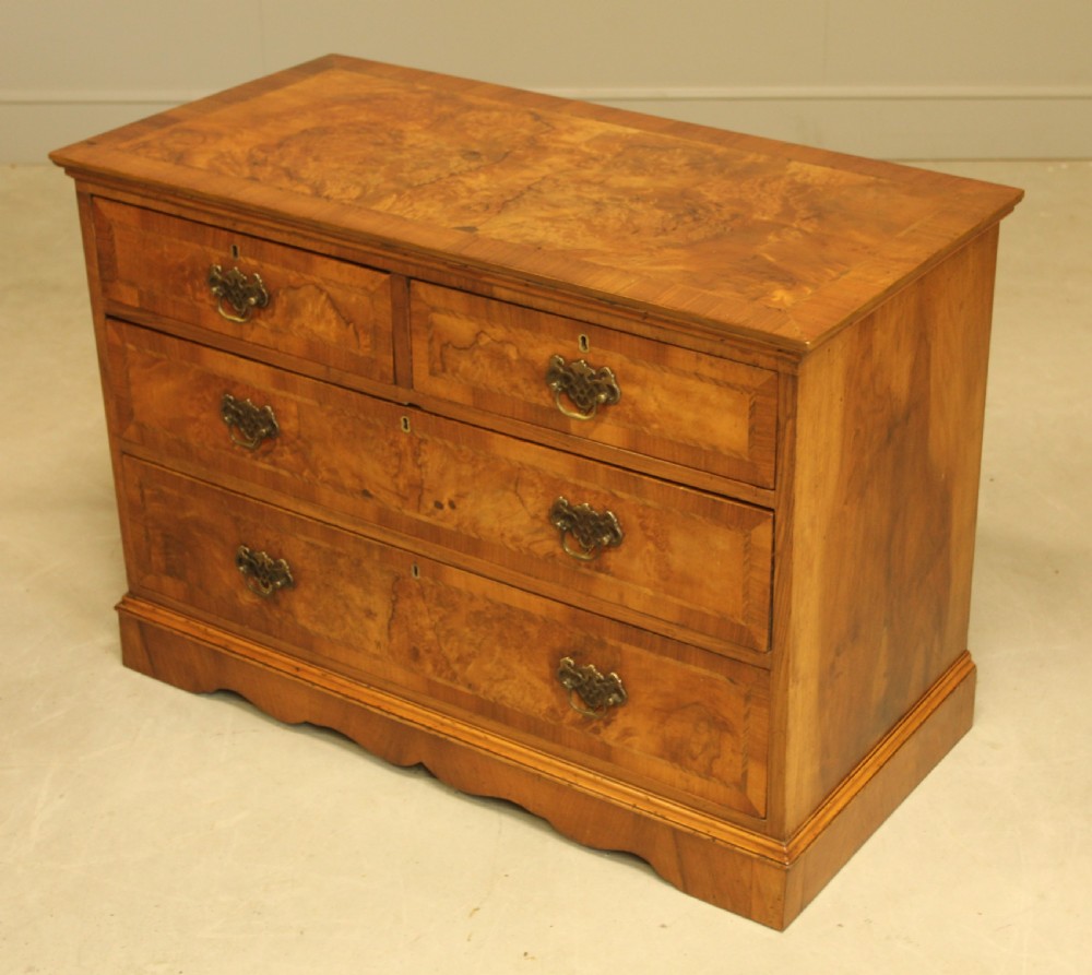 A BURR WALNUT CHEST OF DRAWERS View VII