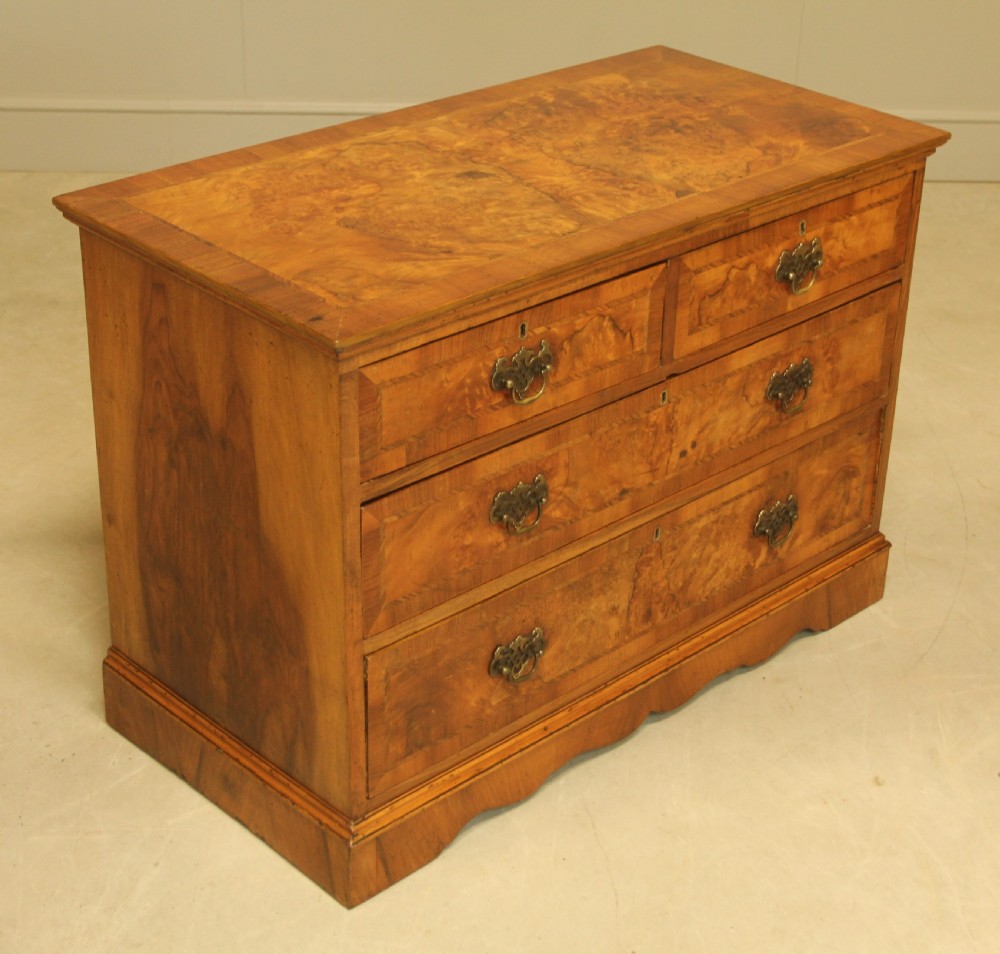 A BURR WALNUT CHEST OF DRAWERS View VIII