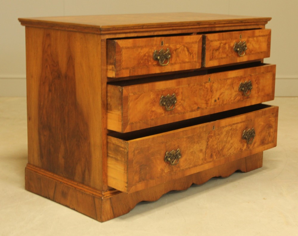 A BURR WALNUT CHEST OF DRAWERS View IX