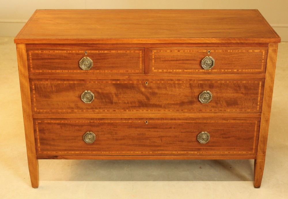 AN EDWARDIAN MAHOGANY CHEST OF DRAWERS View II