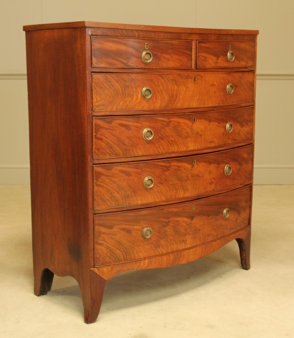 A 19th century bow fronted chest of drawers