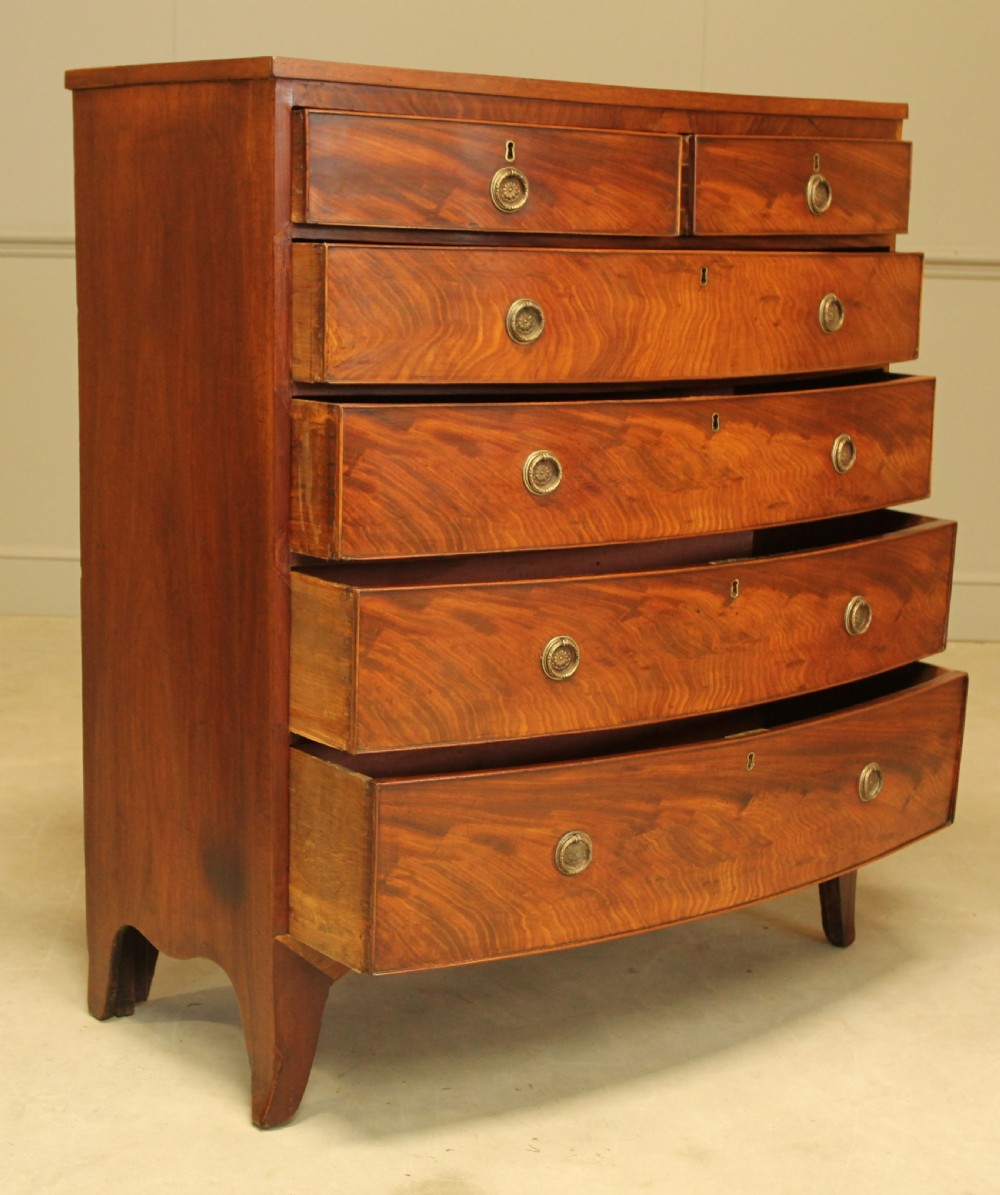 A 19th century bow fronted chest of drawers View IV