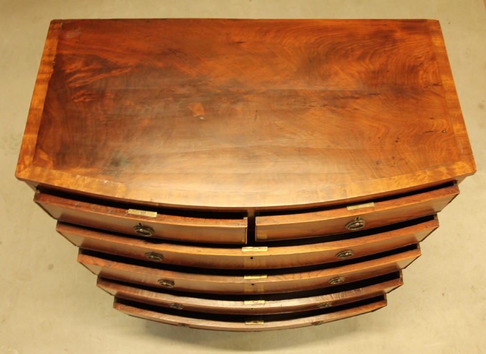 A 19th century bow fronted chest of drawers View VIII