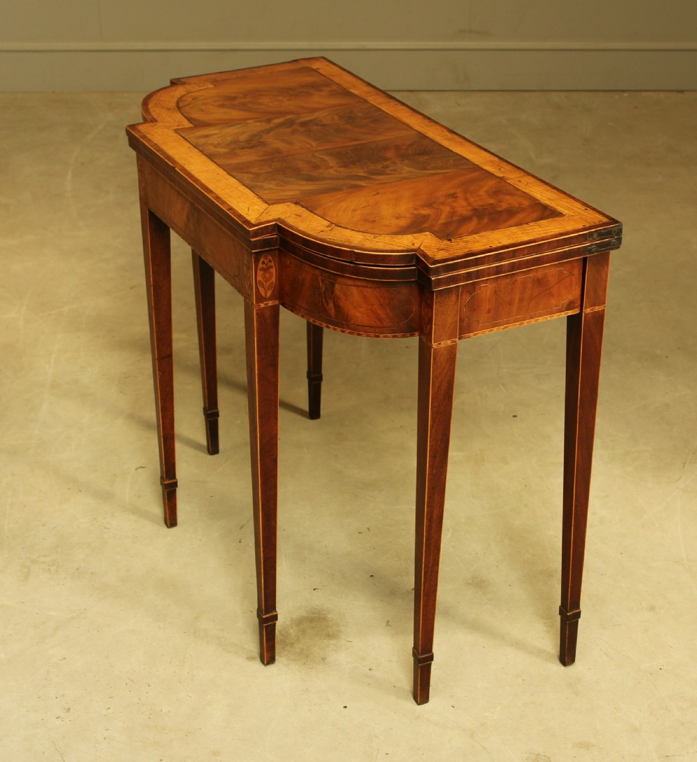 A Sheraton period mahogany breakfront card table.  View VII