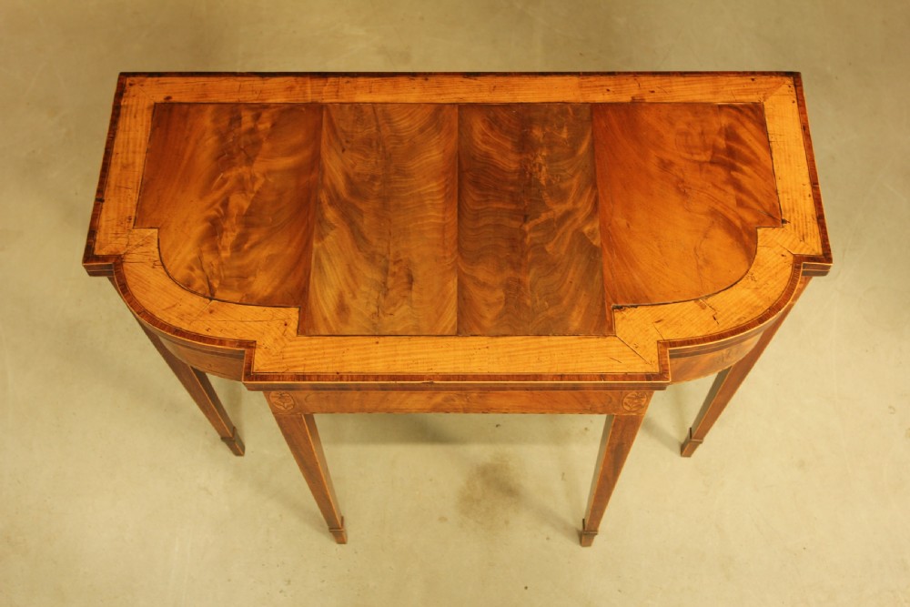 A Sheraton period mahogany breakfront card table.  View VIII