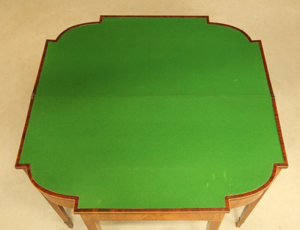 A Sheraton period mahogany breakfront card table.  View X