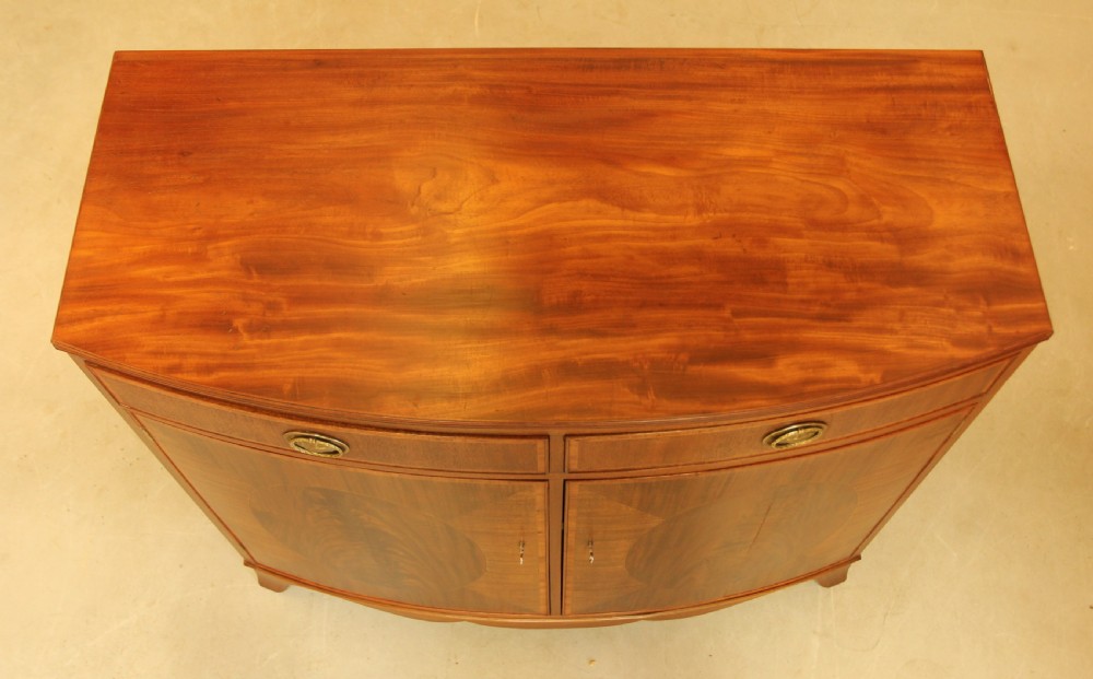 A TWO DOOR BOW FRONTED SIDEBOARD View IX