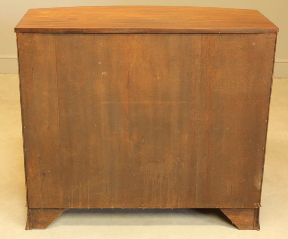 A TWO DOOR BOW FRONTED SIDEBOARD View X
