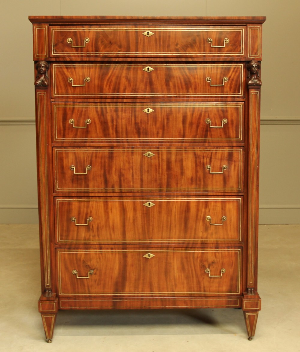 An 19th century French brass inlay mahogany chest of drawers. 