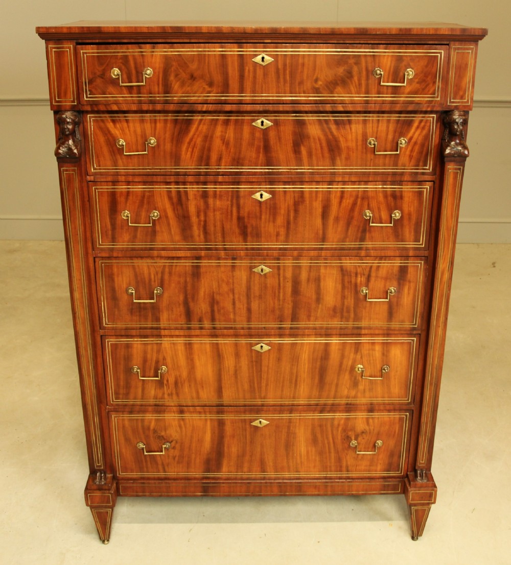 An 19th century French brass inlay mahogany chest of drawers.  View II
