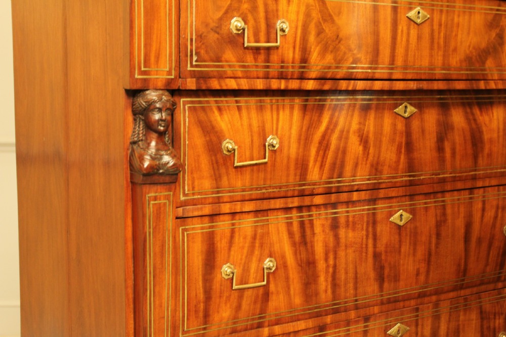 An 19th century French brass inlay mahogany chest of drawers.  View VIII