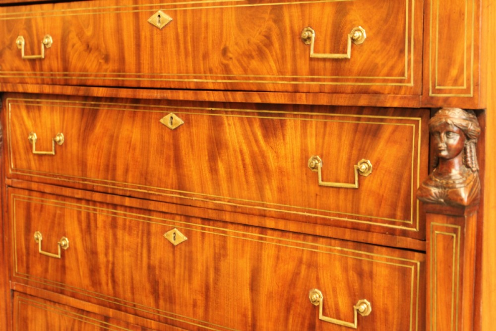 An 19th century French brass inlay mahogany chest of drawers.  View IX