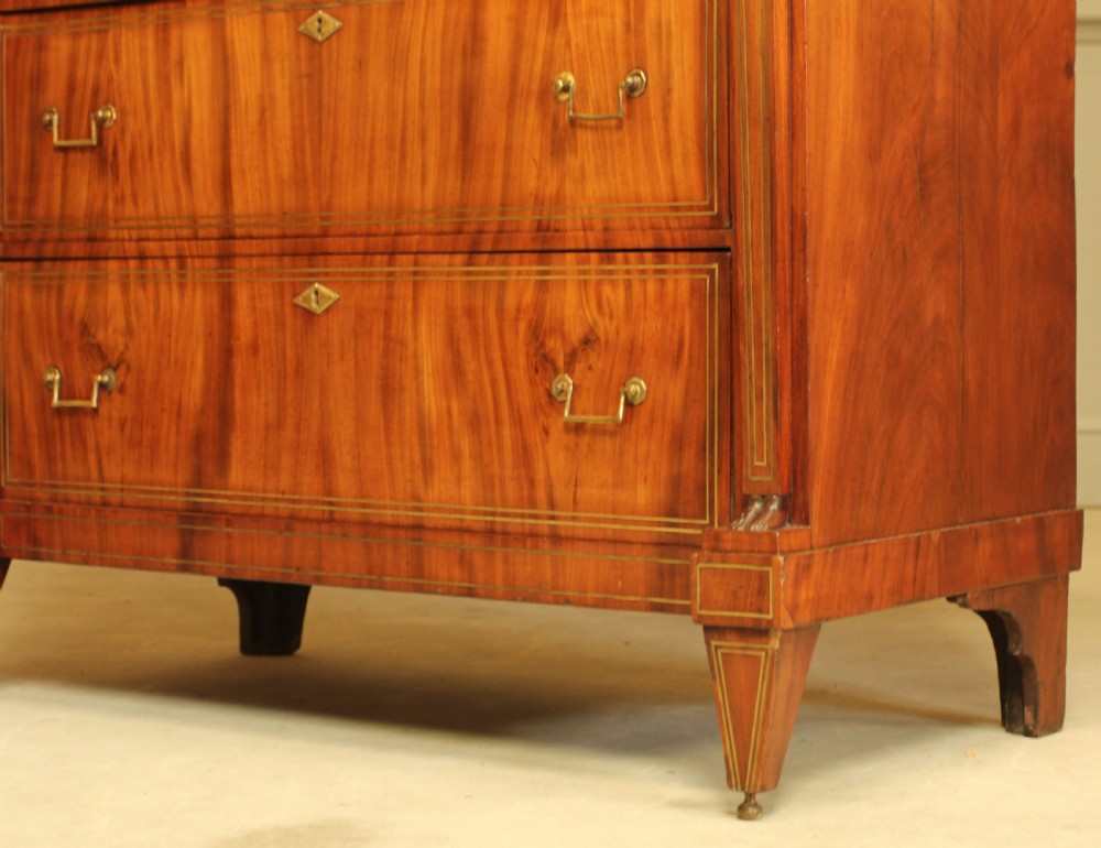 An 19th century French brass inlay mahogany chest of drawers.  View XI