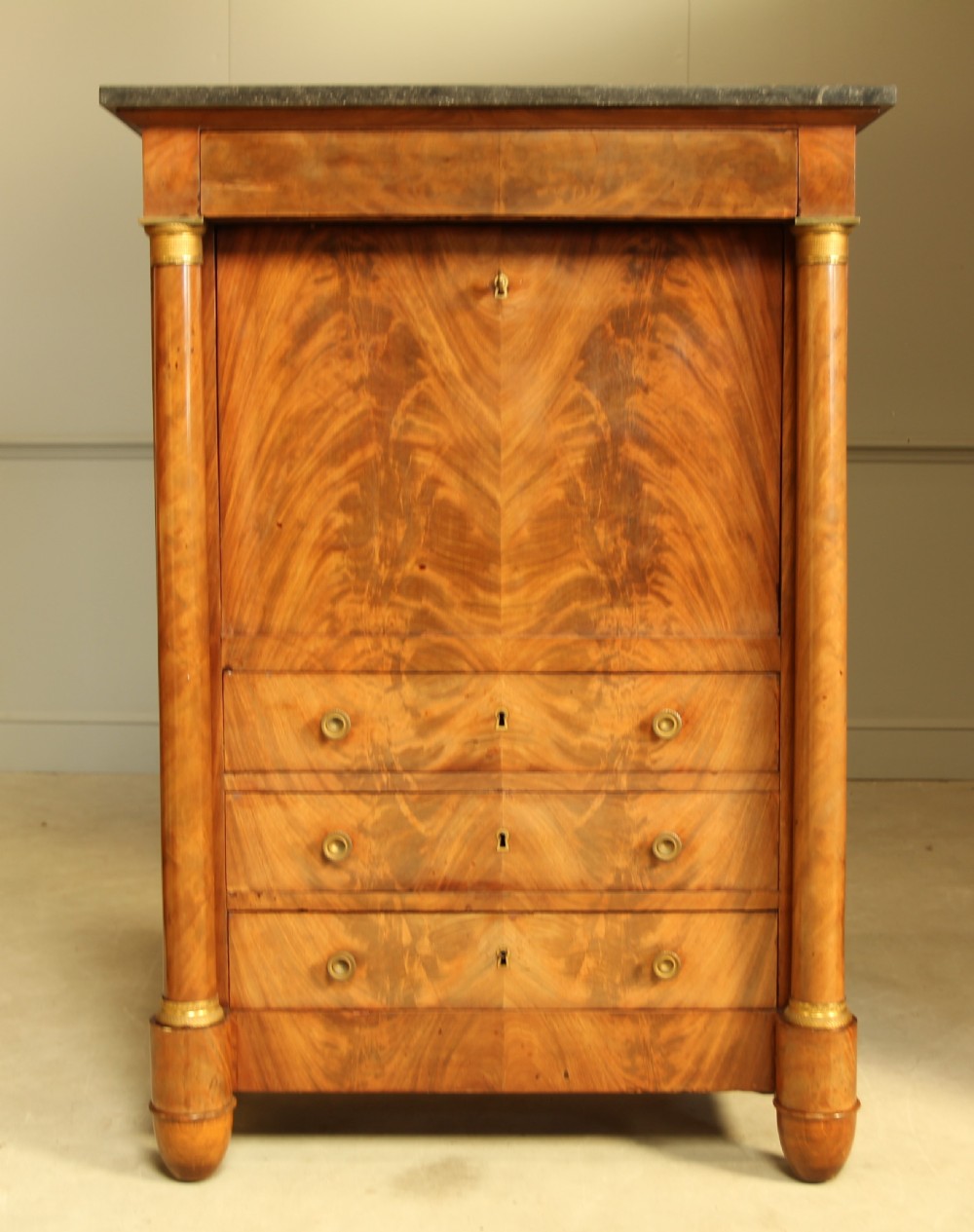 AN EARLY FRENCH MAHOGANY ESCRITOIRE