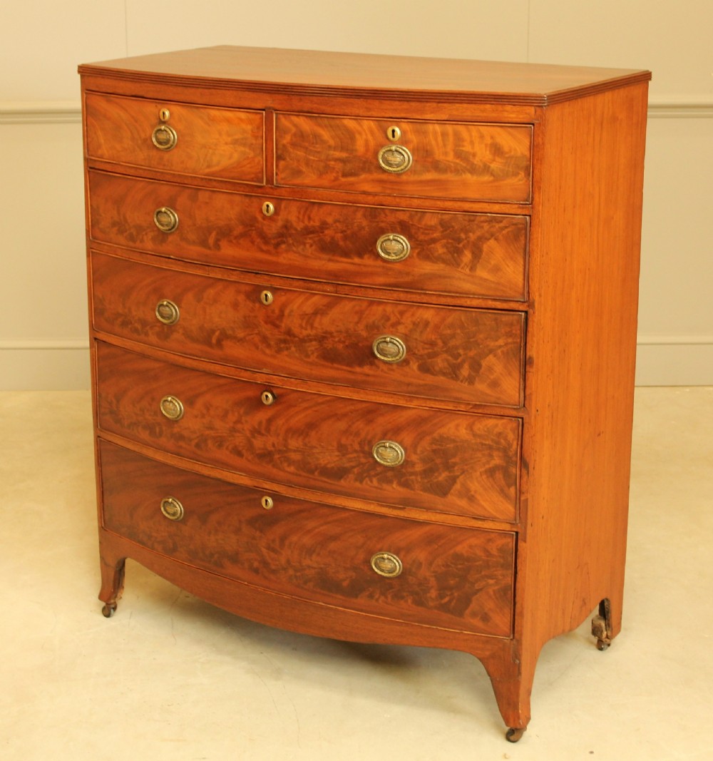 A Regency mahogany bow fronted chest of drawers. View III