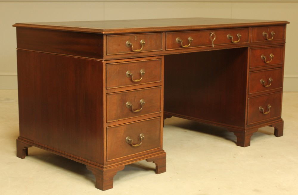 A LARGE MAHOGANY TWIN PEDISTAL DESK View III