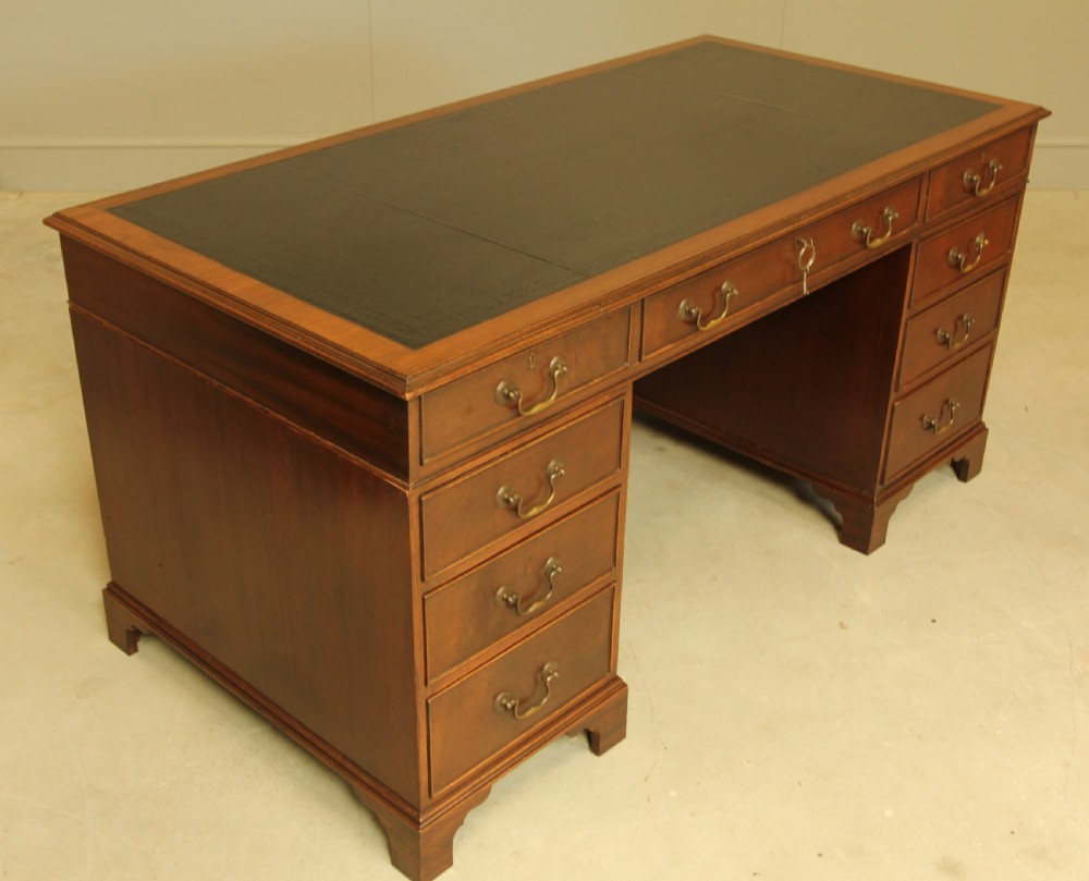 A LARGE MAHOGANY TWIN PEDISTAL DESK View V