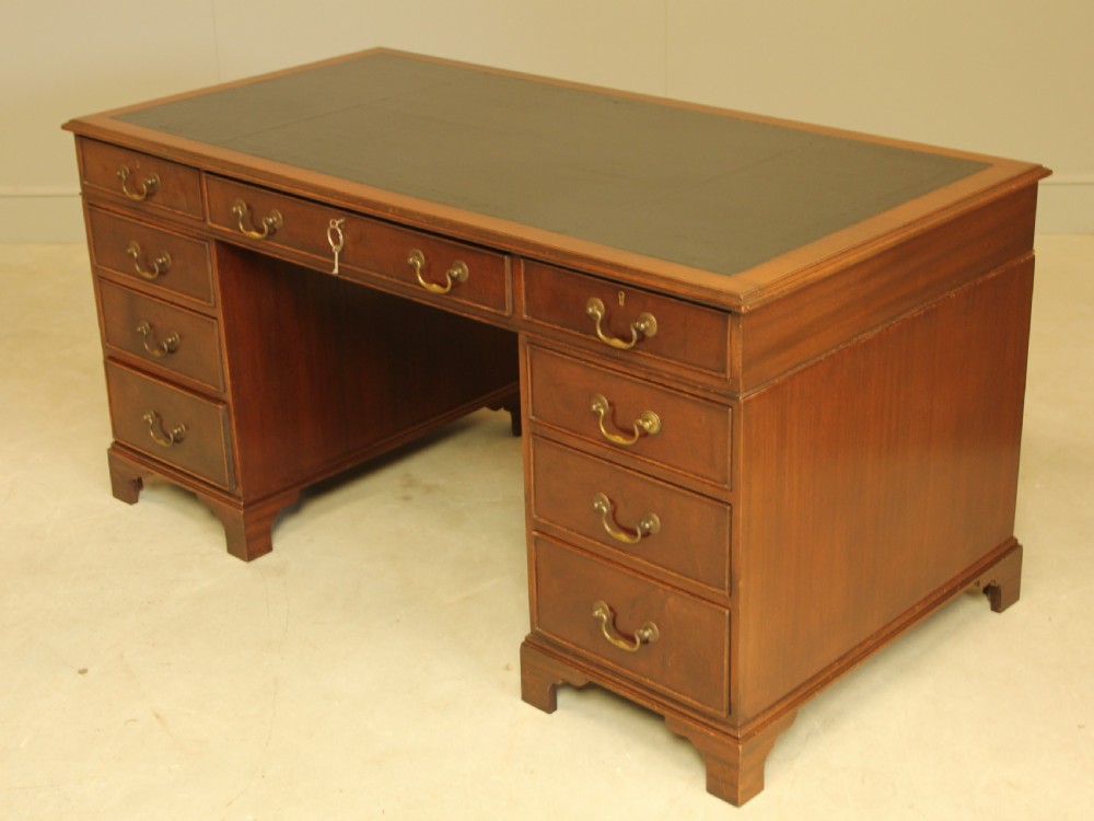 A LARGE MAHOGANY TWIN PEDISTAL DESK View VI