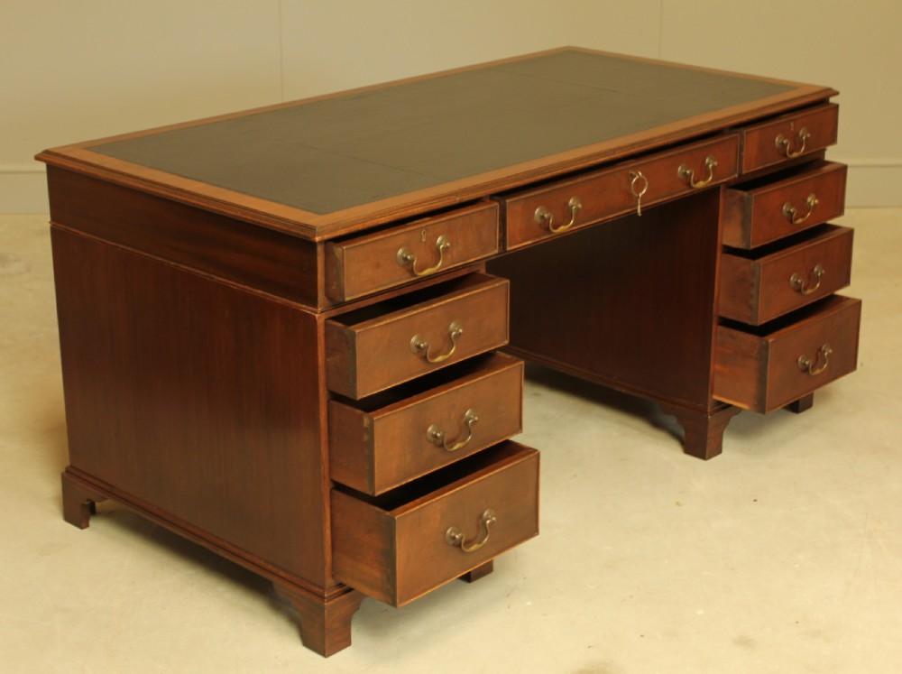 A LARGE MAHOGANY TWIN PEDISTAL DESK View VII