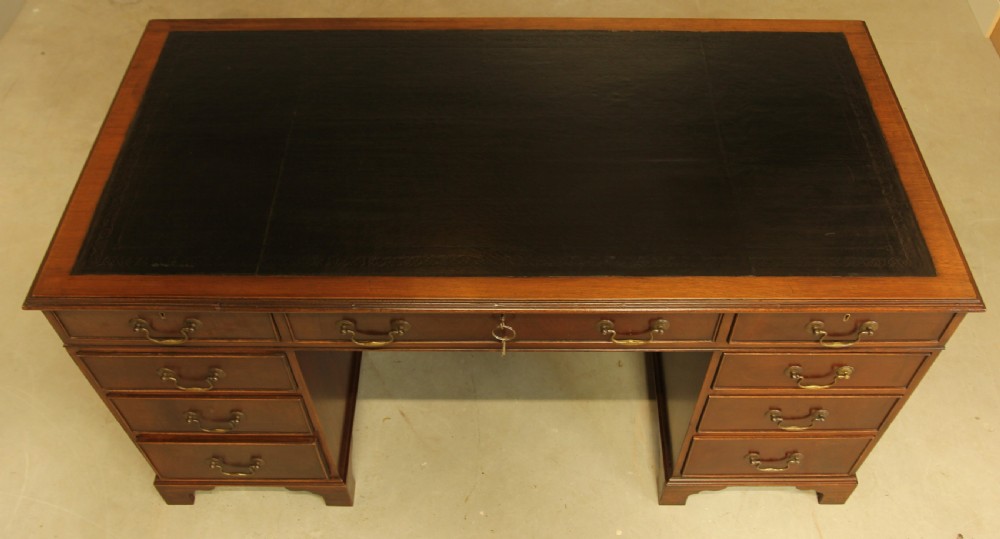 A LARGE MAHOGANY TWIN PEDISTAL DESK View VIII
