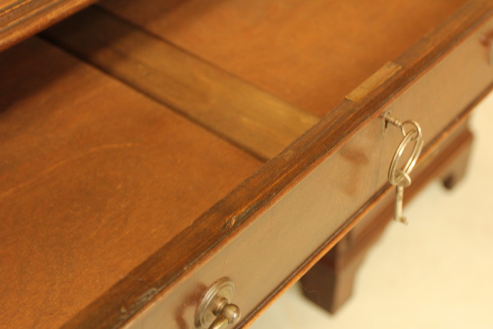 A LARGE MAHOGANY TWIN PEDISTAL DESK View IX