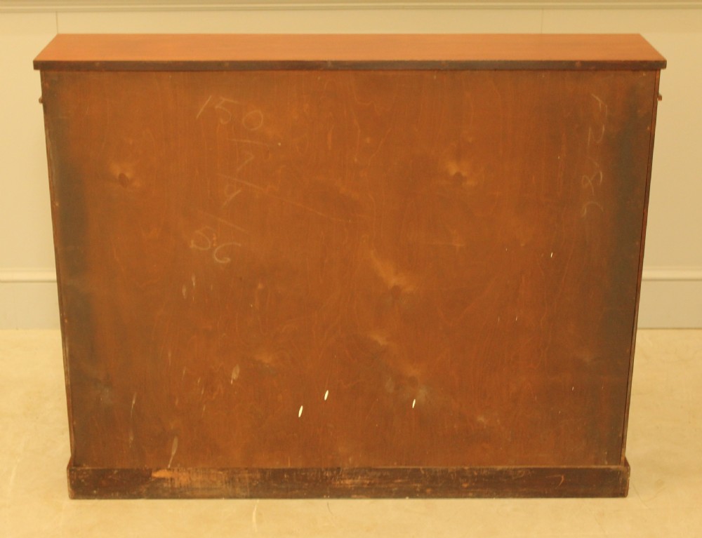 An early 20th century mahogany open bookcase. View VIII