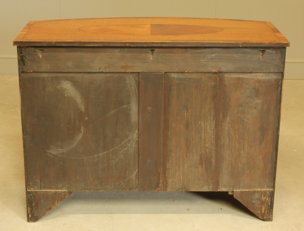 AN EDWARDIAN SATINWOOD BOW FRONTED TWO DOOR SIDEBOARD. View XI