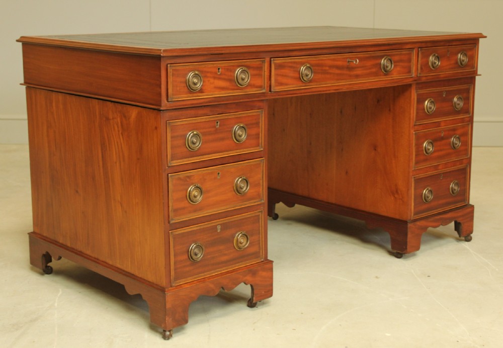 A VICTORIAN MAHOGANY TWIN PEDESTAL DESK