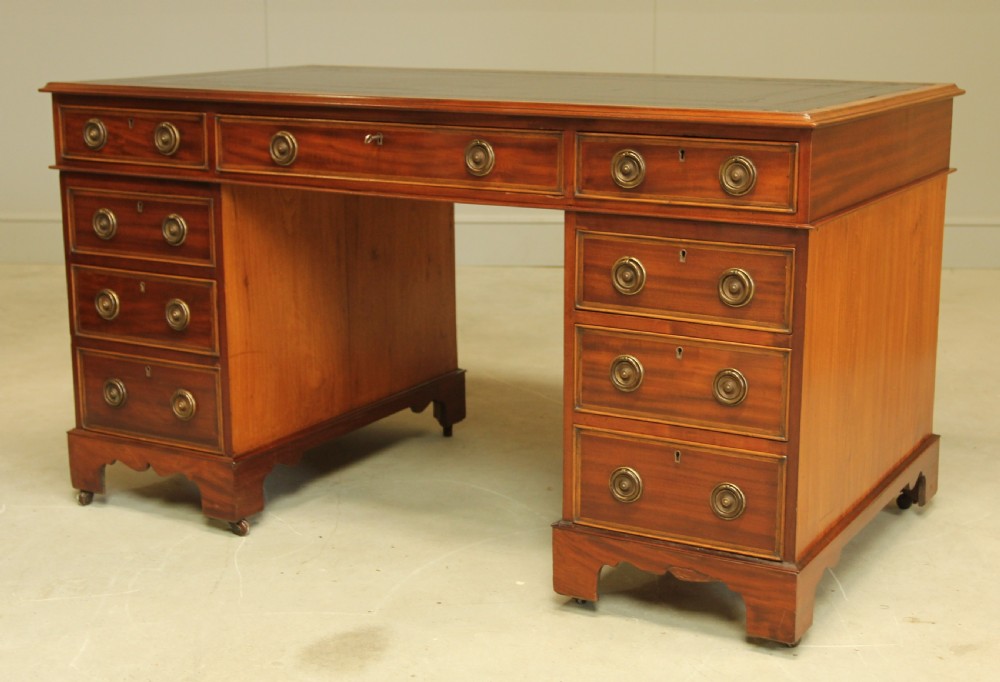 A VICTORIAN MAHOGANY TWIN PEDESTAL DESK View II