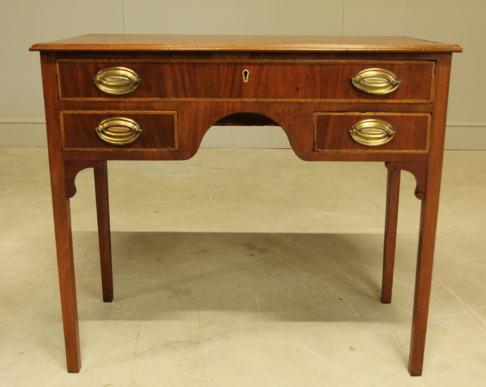 A 19th century mahogany kneehole side table. 