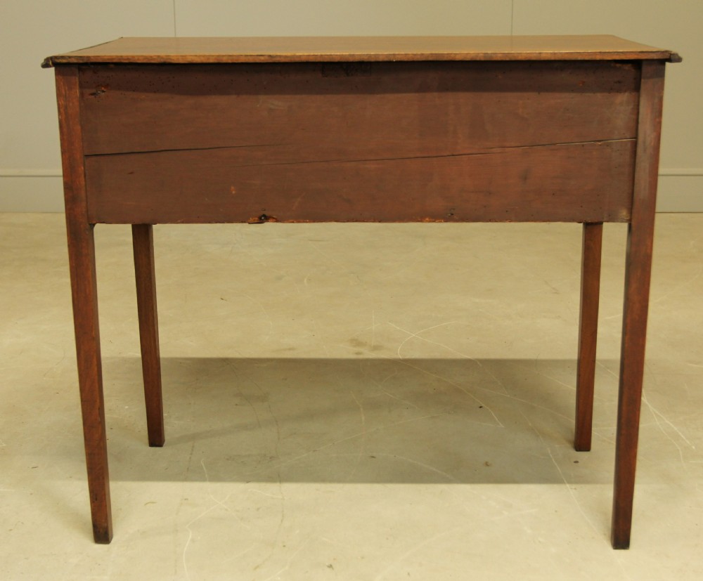 A 19th century mahogany kneehole side table.  View X