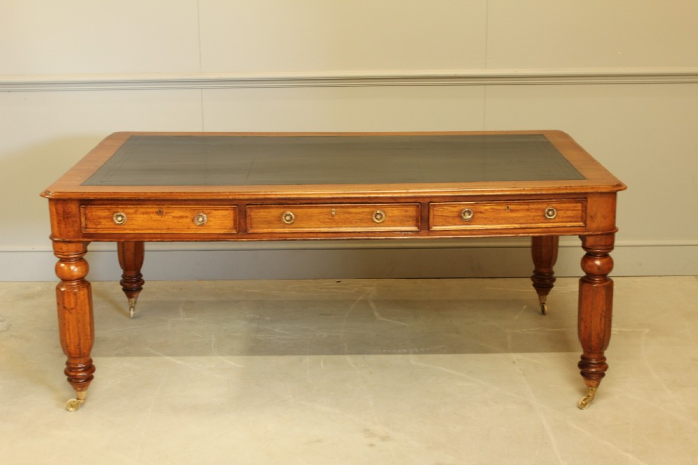 A LARGE VICTORIAN PARTNERS LIBRARY TABLE