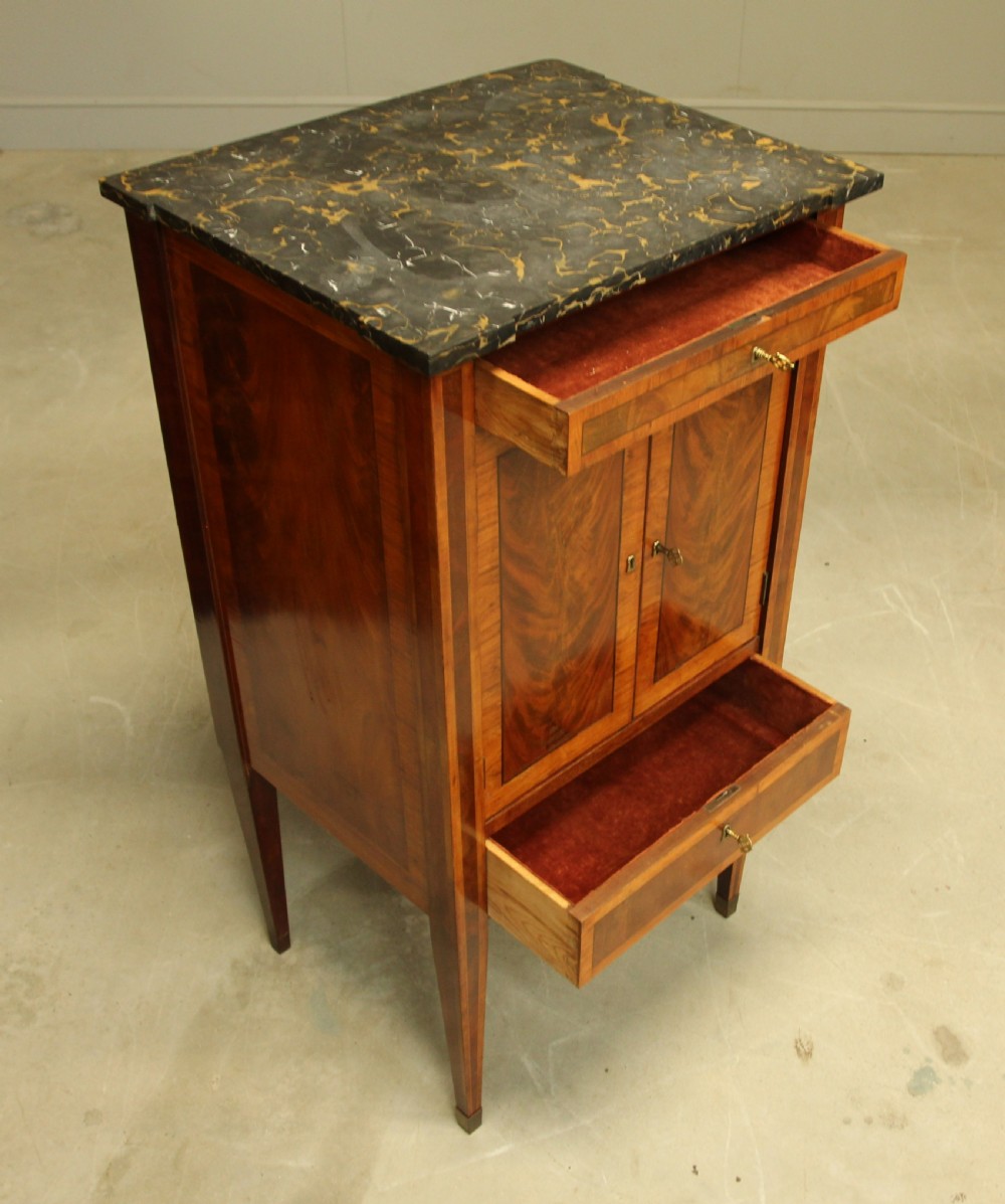 A French 19th century marble topped mahogany music cabinet. View IX