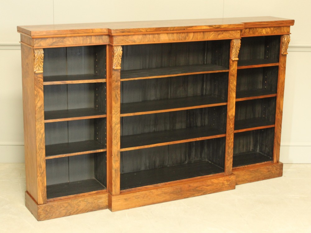 A large Victorian breakfront burr walnut open bookcase.  View II