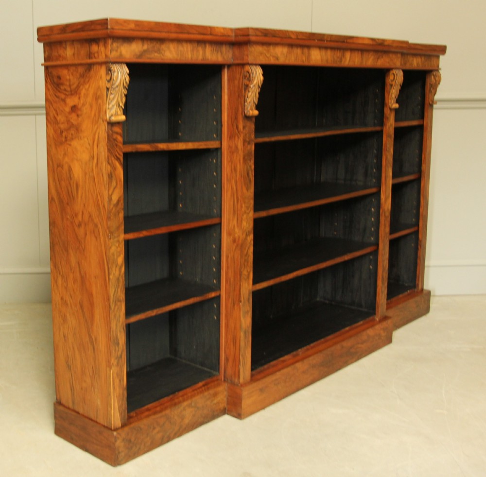 A large Victorian breakfront burr walnut open bookcase.  View IV