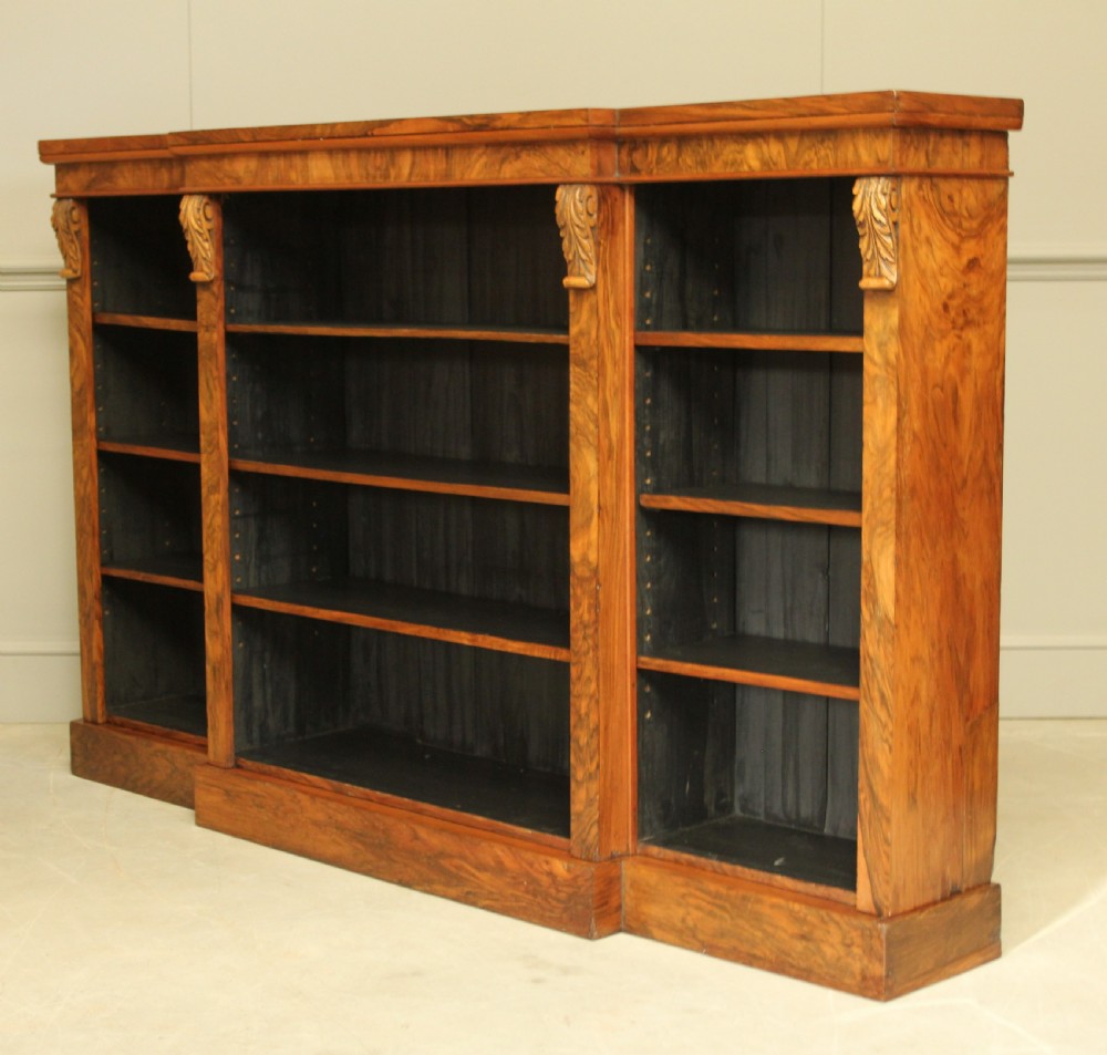 A large Victorian breakfront burr walnut open bookcase.  View V