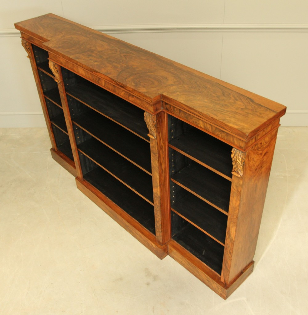 A large Victorian breakfront burr walnut open bookcase.  View VI