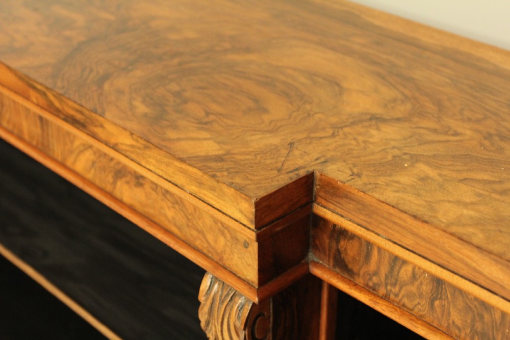 A large Victorian breakfront burr walnut open bookcase.  View VIII
