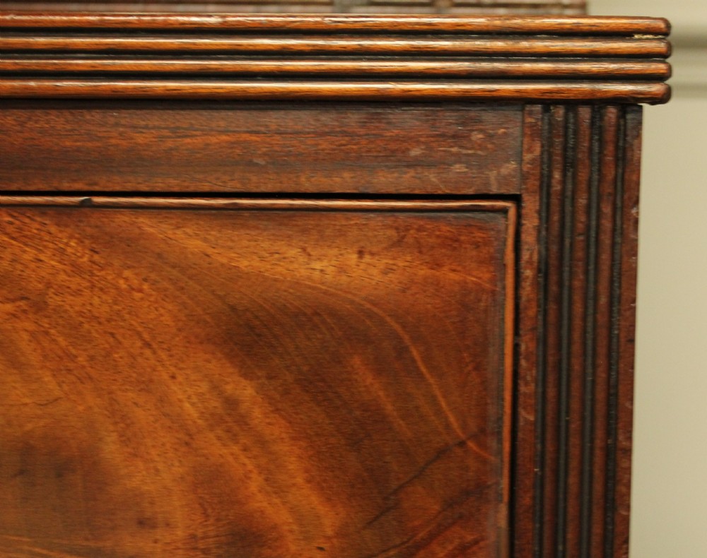 A 19TH CENTURY MAHOGANY BOOKCASE DISPLAY ON CHEST. View IX