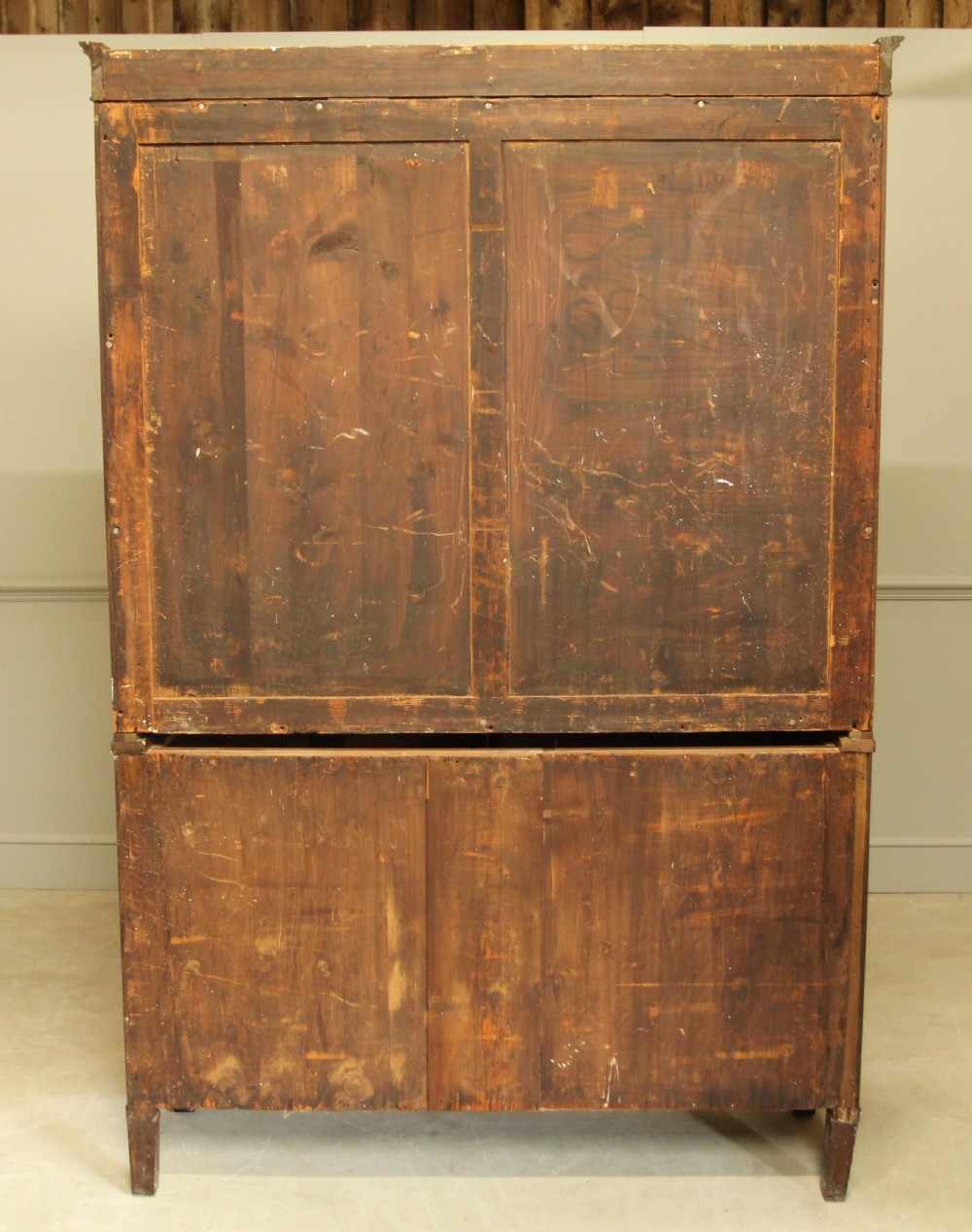 A 19TH CENTURY MAHOGANY BOOKCASE DISPLAY ON CHEST. View X
